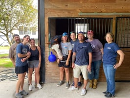 The NOBLE Stevensville, MD Operations team at Talisman Therapeutic Riding prepares for their service project